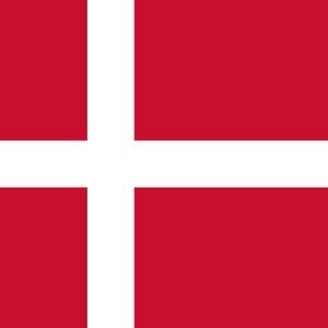 May include: The flag of Denmark, a red rectangular flag with a white cross extending to the edges.
