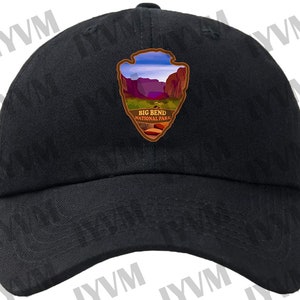 May include: Black baseball cap with a brown patch featuring a scenic image of Big Bend National Park, Texas. The patch has the text "Big Bend National Park" in white.