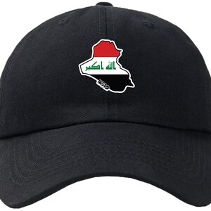 May include: Black baseball cap featuring an embroidered outline of Iraq with the Iraqi flag colours and the word "IRAQ" underneath.