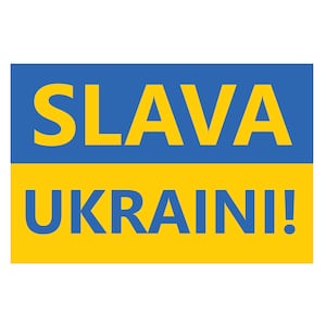 May include: A blue and yellow sign with the text "SLAVA UKRAINI!" in yellow letters.