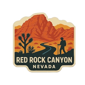 Op de afbeelding: Een sticker met een woestijnlandschap met een weg die naar een bergketen leidt. Een persoon met een rugzak en wandelstok is rechts als silhouet afgebeeld. De tekst "RED ROCK CANYON NEVADA" staat onderaan.