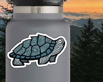 May include: A blue and black turtle sticker with a detailed shell design. The sticker is 2 inches by 3 inches and is on a gray water bottle. The sticker is from Life Outside Sticker Company.