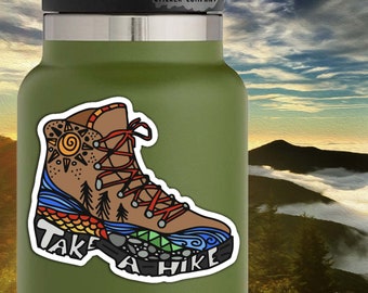 May include: A colorful hiking boot sticker with the words "Take a Hike" on the bottom. The sticker is 2.5 inches by 3 inches.