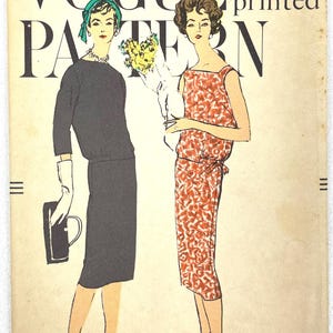 May include: Vintage Vogue sewing pattern for two dresses. The pattern is printed on a cream-colored paper with a black and white illustration of two women wearing the dresses. The pattern number is 9497 and the price is 75 cents. The text "printed" is also visible on the pattern.