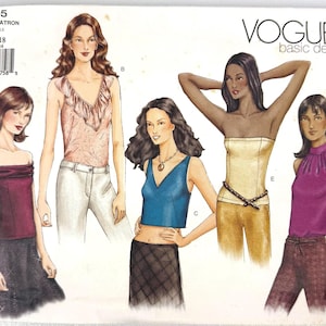 May include: Vogue basic design sewing pattern 2505. The pattern features illustrations of various women's tops, including a ruffled top, a halter top, and a tube top. The pattern includes sizes 14, 16, and 18.