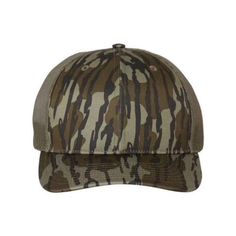 May include: A camouflage baseball cap with a curved peak and a mesh back. The cap features a pattern of brown, green, and tan colours. The cap has a button on top.