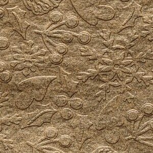 May include: A brown paper sheet with an embossed pattern of holly leaves, berries, snowflakes, and pine cones.
