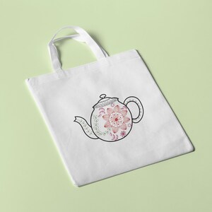 May include: White tote bag featuring a black and white outline of a teapot with a floral design. The teapot is decorated with pink and red flowers.