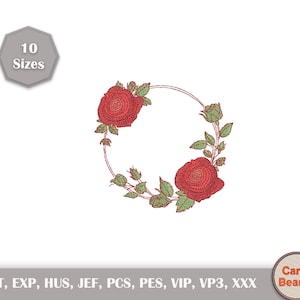 May include: An embroidered floral design featuring two red roses and green leaves arranged in a circular wreath. The design includes the text "10 Sizes" and the Carry Beauty logo. The image is on a white background.