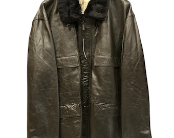 May include: A long black leather jacket with a black faux fur collar. The jacket has a zipper closure and multiple pockets.
