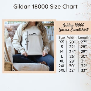 May include: Size chart for a Gildan 18000 unisex sweatshirt. The chart shows the width and length measurements in inches for sizes XS to 3XL.