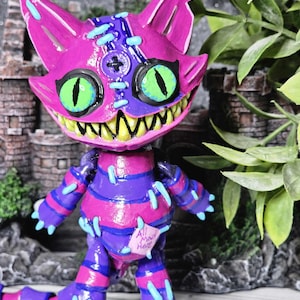 Whimsical Cheshire Cat-Inspired 3D Print | Glow-in-the-Dark Mischievous Cat Figurine | Blacklight Reactive