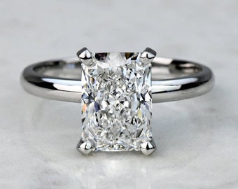 Radiant Cut Solitaite Moissanite Engagement Ring In Platinum