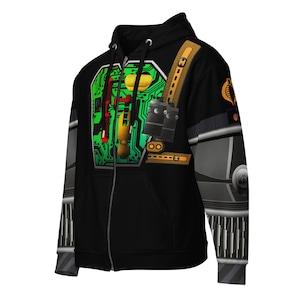 May include: Black zippered hoodie with a green circuit board design on the front and a gray and black design on the sleeves. The design includes a yellow and red button, a black and silver device, and a brown strap.