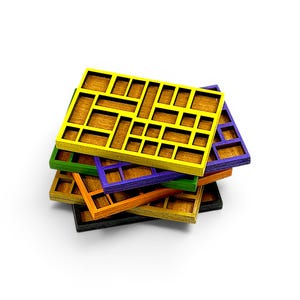 May include: A stack of rectangular wooden trays with internal grid dividers. Each tray features a different colored frame, including yellow, purple, green, orange, and black, with a natural wood-toned base visible within each individual compartment.