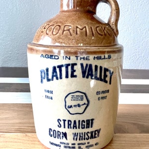 Rustic Corn Whiskey Jug. Vintage Whiskey Advertising by McCormick. Platte Valley Straight Corn Whiskey. Primitive Advertising for Home Bars.