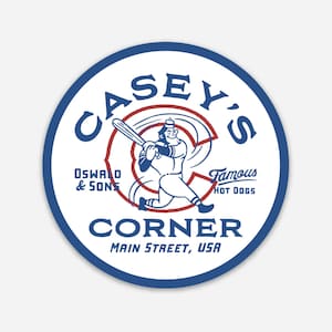 May include: A white circle with a blue border, featuring a cartoon baseball player swinging a bat. The text "Casey's" is in a red circle above the player, with "Oswald & Sons" and "Famous Hot Dogs" below. The text "Corner" is in a red rectangle below the player, with "Main Street, USA" below that.