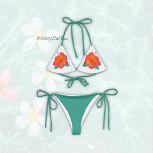 May include: White bikini top and teal bottoms. The top features a floral design with orange and red hibiscus flowers. The bikini has teal ties. The text "@DirtyTiniTees" is visible in the image.