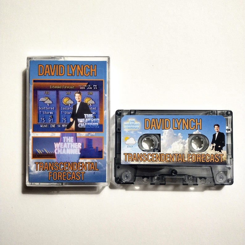 May include: A black cassette tape with a clear plastic case. The tape has a blue and white label with the text "DAVID LYNCH TRANSCENDENTAL FORECAST" and a picture of a man in a suit standing in front of a cloudy sky. The tape is a parody of The Weather Channel.