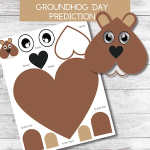 Puede incluir: Una actividad de manualidades imprimible para el Día de la Marmota. La imprimible presenta una marmota marrón con una cabeza en forma de corazón, una nariz negra y dientes blancos. La imprimible también incluye piezas separadas para los ojos, las orejas y la cabeza de la marmota.