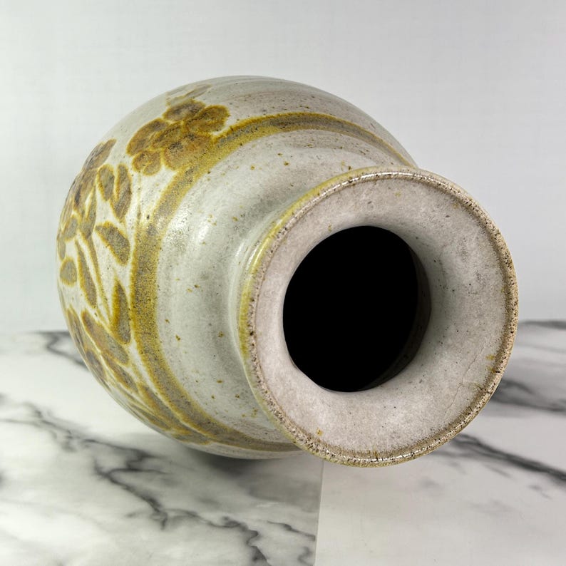 Vintage BAS studio pottery vase, handmade, light sand colour with brown and pale gold leaf and flower motif, 10.5" tall, signed, high-quality glaze.