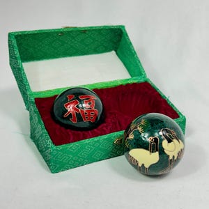 Vintage Chinese Harmony Chiming Meditation Balls Fuku Ju Calligraphy Enamelled Metal Baoding Balls In Green Silk Brocade Box circa 70’s