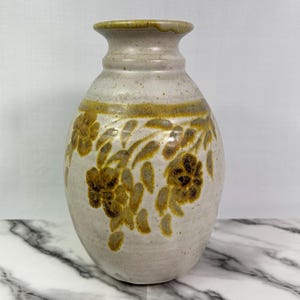 Vintage BAS studio pottery vase, handmade, light sand colour with brown and pale gold leaf and flower motif, 10.5" tall, signed, high-quality glaze.