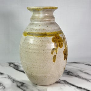 Vintage BAS studio pottery vase, handmade, light sand colour with brown and pale gold leaf and flower motif, 10.5" tall, signed, high-quality glaze.
