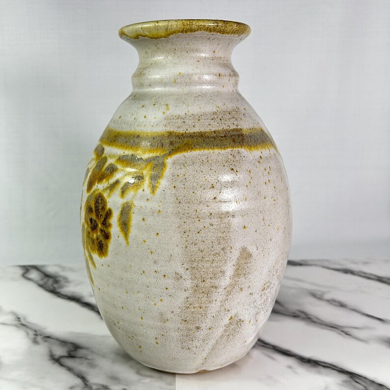 Vintage BAS studio pottery vase, handmade, light sand colour with brown and pale gold leaf and flower motif, 10.5" tall, signed, high-quality glaze.