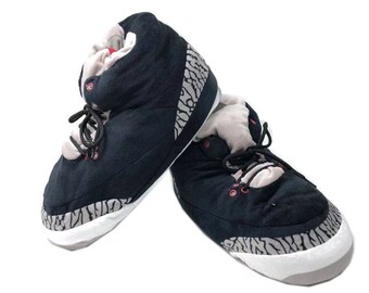 black jordan slippers