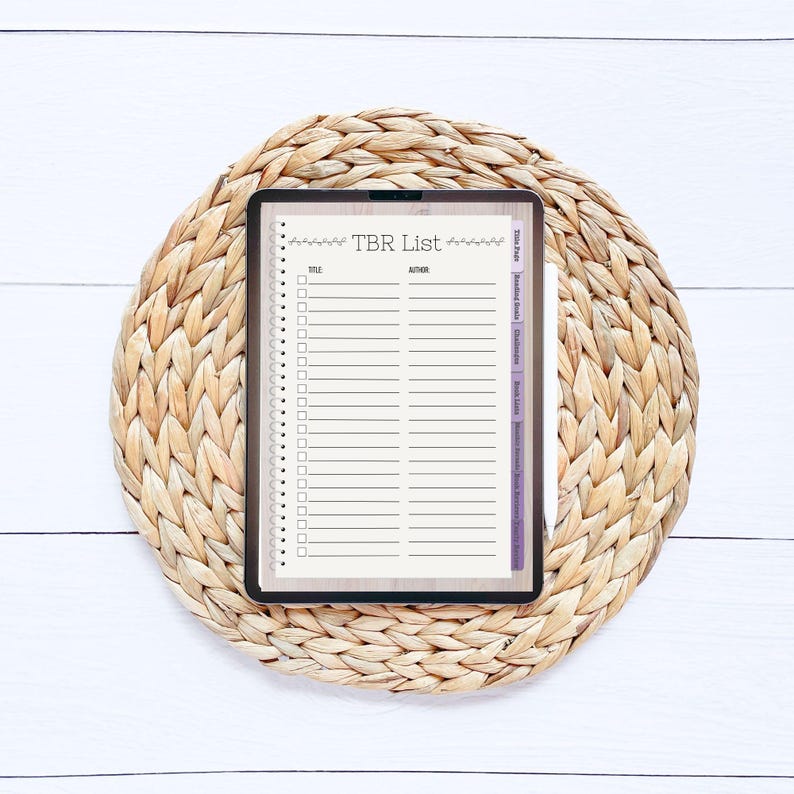 May include: A digital planner open to a page titled "TBR List" with columns for "Title" and "Author". The page has a checklist of empty boxes for tracking books to be read.