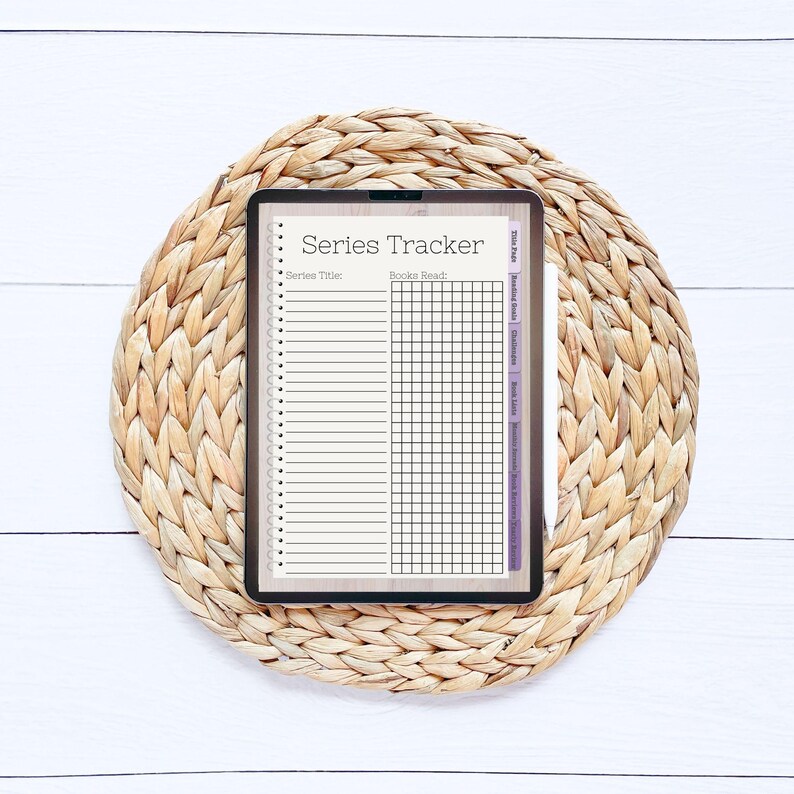 May include: A digital planner on a tablet with a brown wicker mat background. The planner is titled "Series Tracker" and has sections for "Series Title" and "Books Read".