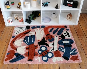 Hand tufed 100% wool rug with spring flower and insect design.