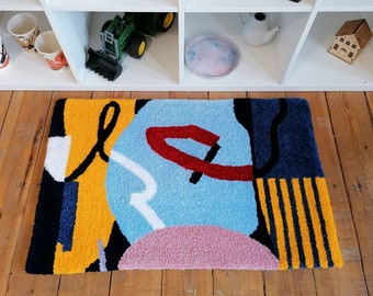 Geometric rug. Hand tufted. 100% acrylic rug. Geometric shapes and lines.