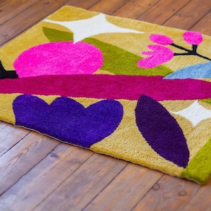 Colourful snail rug. Handmade tufted rug. 100% acrlic image 1