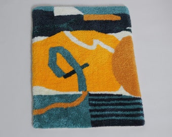 Bright geometric tufted rug. Funky shapes. Geometric shapes and lines.