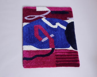 Geometric shape rug. Bright colours and funky shapes. Tufted rug.