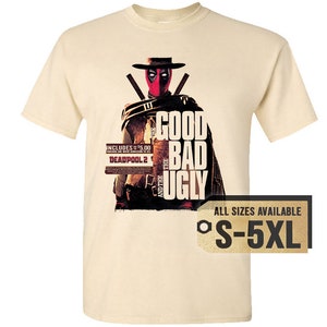 May include: Cream-colored t-shirt featuring a Deadpool graphic in a Western-style design. The design includes the text "GOOD BAD UGLY" and "DEADPOOL 2". Available in sizes S-5XL.