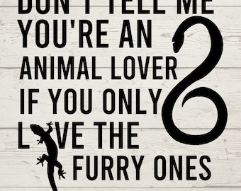 May include: Black and white graphic design with a lizard and a snake. The text reads "Don't tell me you're an animal lover if you only love the furry ones."