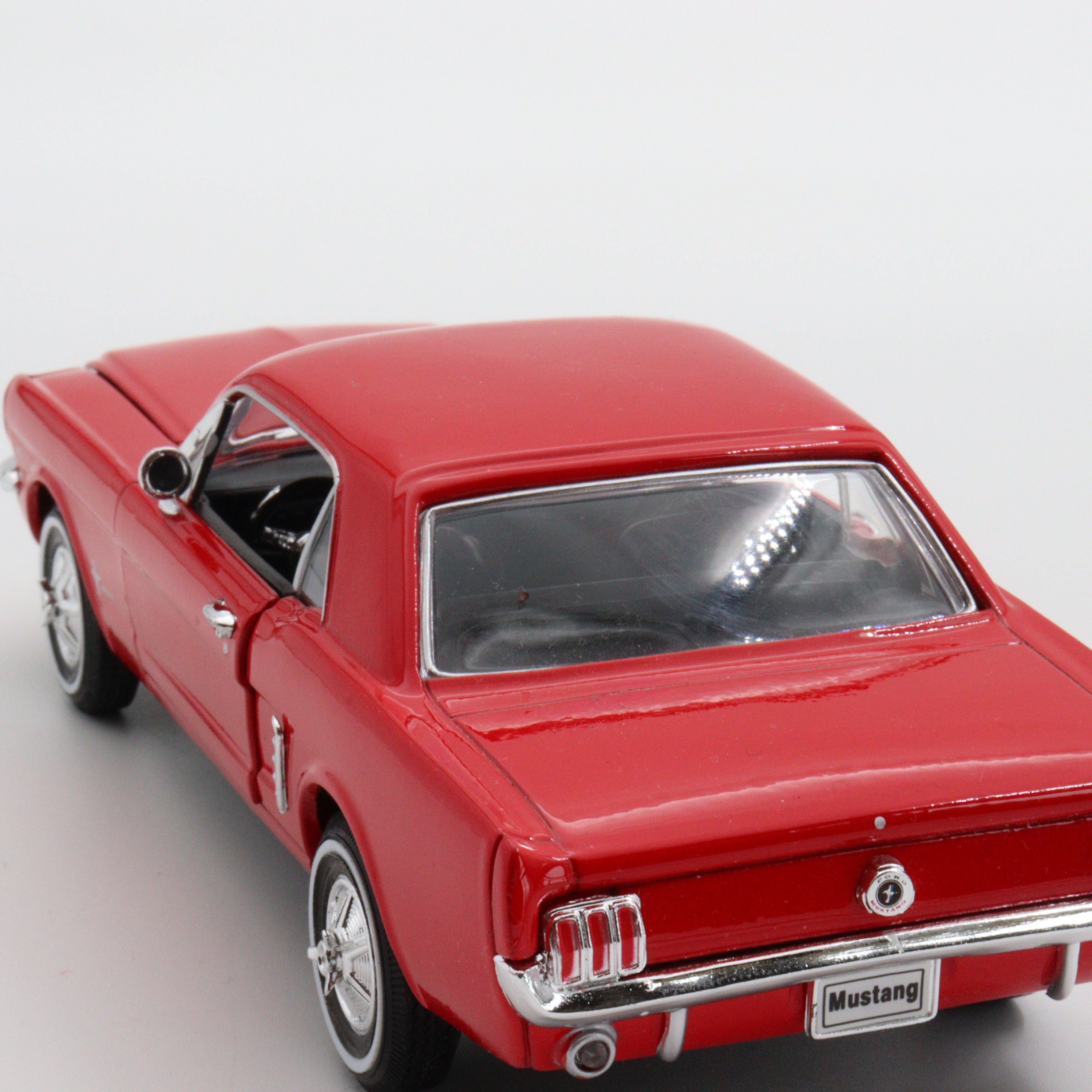 Welly 1964 Ford Mustang Coupe: Red Diecast Model Car (1/24 Scale  display picture 1