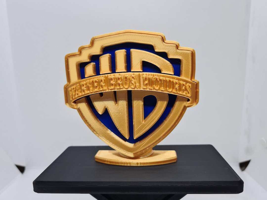 The Warner Bros. Shield new logo and identity - Simpaul Design