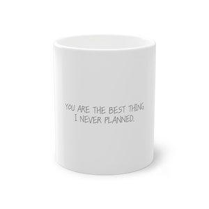 May include: White ceramic mug with the text "You are the best thing I never planned."