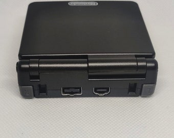 GBA SP Console Refurbished GameBoy Advance Black Backlit larger new 850mAh Battery AGS-001. Boxed new condition & charger.
