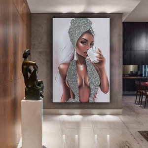 May include: A digital painting of a woman with dark skin wearing a silver sequined top and a white head wrap. She is holding a white cup and looking at the viewer.