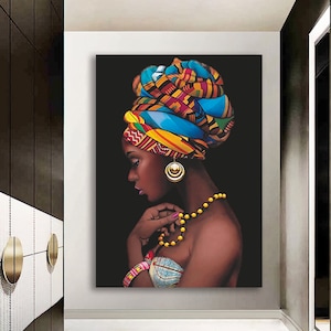 May include: A painting of a woman with dark skin wearing a colourful head wrap and a gold necklace. She is looking down and her hands are clasped in front of her.
