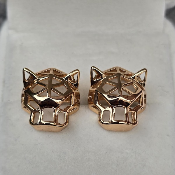 gold and silver plated geometric panther puma stud earrings