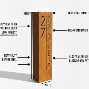 May include: A rectangular, pre-rusted steel address sign with the number 27 and the text "FOX VALLEY CT." The sign is made of heavy-duty 14-gauge steel and includes an LED light and lid. Address can be on any/all four sides upon request.