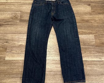 Jeans vintage Sean John da uomo, taglia 36x31, denim scuro con ricamo del leone, stile Y2K.