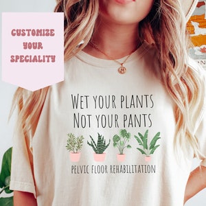 May include: A white t-shirt with the text "Wet your plants not your pants" and a row of potted plants. Below the text is "Pelvic floor rehabilitation".