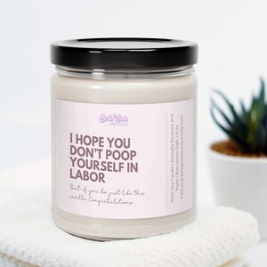 May include: A white soy candle with a black lid and a label that reads "I hope you don't poop yourself in labor. But if you do just like this candle. Congratulations." The candle is 9 oz and is made with ethically sourced soy wax.